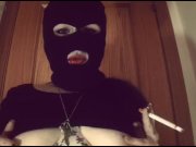 Preview 4 of Girl with a mask plays with her tits and smokes a cigarette