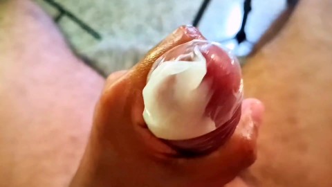 Daddy's big cumshot on a condom