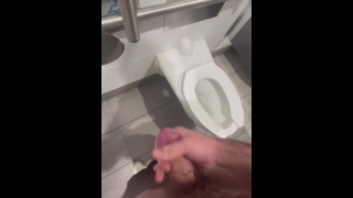 Spit and jerk in public restroom