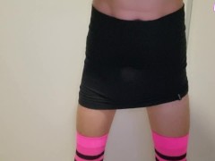 sissy hiding her diaper under her skirt