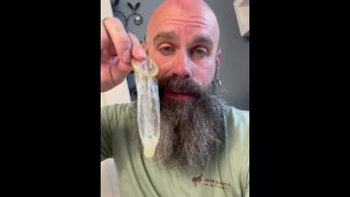 Eating a Load Out of a Condom after being Fucked at Gloryhole