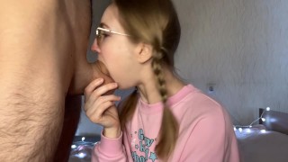 Lots of thick cum for the blonde beauty! Cumshot on the face of a bespectacled cocksucker