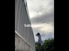 穿着薄薄的连衣裙，黑丝红底细高跟伪娘在天桥上露出 - Screenshot 6 of 16 - Sissy
