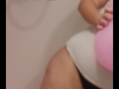Wet BBW playing with balloons
