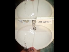 Desperately slow motion explosive peeing in the sink