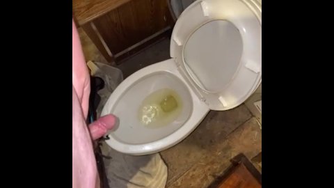 Grown man pissing after along day at work
