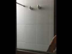 Cute Latina herself in the bathroom of a bar