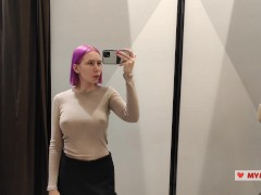 Try on haul sweaters in the fitting room. Big tits beauty pulls on clothes. Upskirt view during fitt