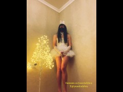 Chinese ladyboy wearing white gauze skirt cums next to Christmas tree