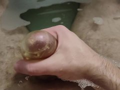 CUTE BOY PLAYS WITH HIS TOY IN HOT WATER