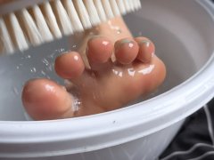 Friend scrubs my feet and gives it a bath. Feet worship