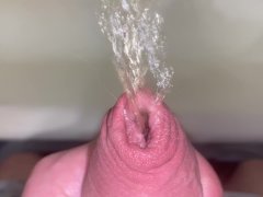 How does urine flow from an uncircumcised penis without opening it? 4K POV