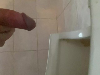 Pissing with a Big Dick with Big Balls in a Public Toilet in a Urinal
