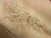 Preview 1 of Redhead with a huge bush and hairy pits combs her body hair and spreads her big gaping pussy.
