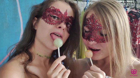 2 girls love to suck a lollipop but they love dick more