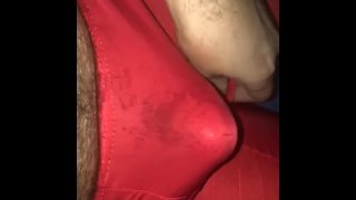 Cock stroking through thin red underwear shows really hot shapes