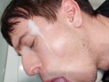 Young dick cruising twink whore takes an older man's load on face & in mouth at public male restroom