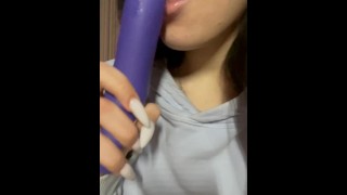 playing with a rubber dick on camera