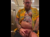 Bearded Tattooed Daddy jerks off in public restroom