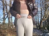 hot trans girl pissing peeing her pants, wetting herself outside in public. RISKY
