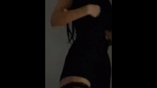 Pretty girl stripping in a new dress