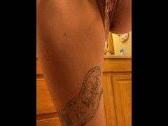 Piss Slut pissing in her garbage can