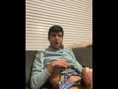 Hot stud jerks off on couch