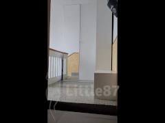 Wife shows the plug in her ass while the delivery guy is in front of her