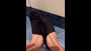 Playing with my black socks in bathroom