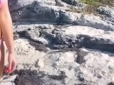 I show my tits on a public beach and I touch my pussy