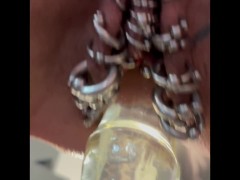 Riding big dildo with a lot of piercings
