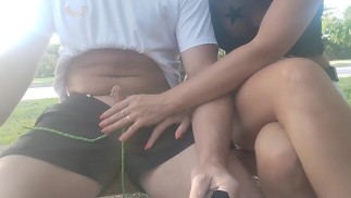 public cock play on the bench, she touches him