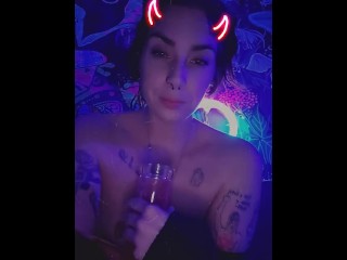 Stoner Girl Takes a Toke with Nipples out