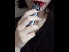 Smoking women with red lipstick