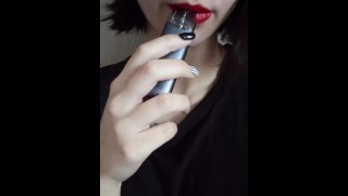 Smoking women with red lipstick