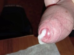 An excited big cock in close-up really wants to cum. Milky thick cum