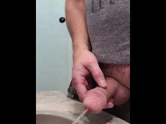 Piss and cum from a hard cock
