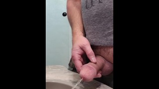 Piss and cum from a hard cock