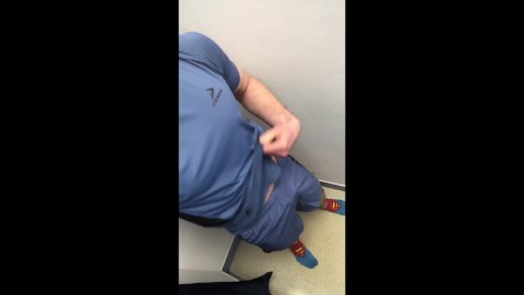 boy jerks off his big dick in the fitting room