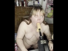 Whore loves to destroy its throat with its new machine