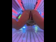 Thick milf gets horny at the tanning salon