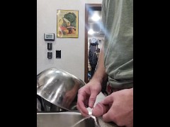A very naughty piss in the kitchen sink