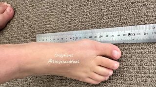 TinySizedFeet Measuring against ruler and common home items, US Size 4, UK Size 1.5, EU 34 tiny feet