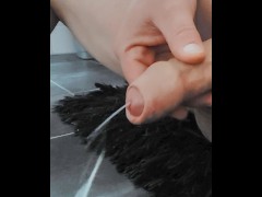 Playing on the bathroom floor. Having my balls tickled by a fluffy carpet