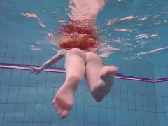Pretty Polish teen Alice swimming without clothes