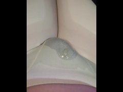 Wetting in white leggings