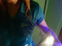 Trans-girl in blue polo shirt and blue pants in the shower.