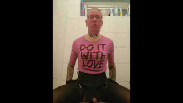 Sissy fucks dildo in pink shirt