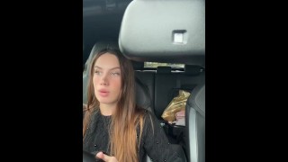 Young French woman in heat in her car