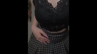 Pretty girl twirls her ass in a mini skirt